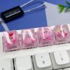 transparent-pink-kirby-keycaps-on-keyboard
