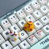 yellow-white-unhappy-bird-keycaps-background