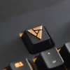 artifact-logo-keycap-left-view