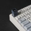black-trash-can-keycap-on-keyboard