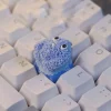 blue-little-monster-keycap-side