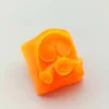 gas-mask-keycaps-fluorescent-cumquat-detail