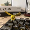 golden-ball-with-wing-keycap-cover