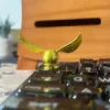 golden-ball-with-wing-keycap-display