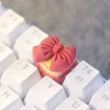 red-ribbon-keycap-side