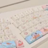 snuggly-penguin-themed-keycap-set-mdafront