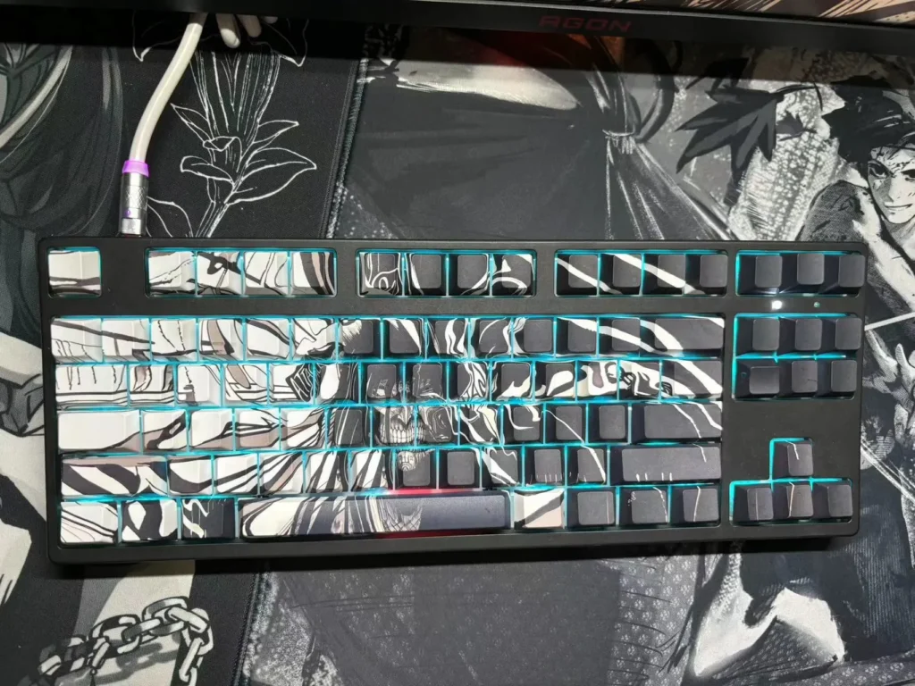 Epic hand-sculpted Attack on Titan keycap set showcasing a backlit beast-form sculpture with translucent, glowing details, a premium artisan collectible.