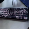 Epic Attack on Titan beast titan artisan keycap set. Observe the beast-form sculpture, vivid backlit translucent details, and intricate craftsmanship.