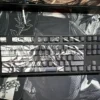 Multiple angles of the epic hand-sculpted Attack on Titan artisan keycap set, showcasing its intricate beast-form details and stunning translucent.