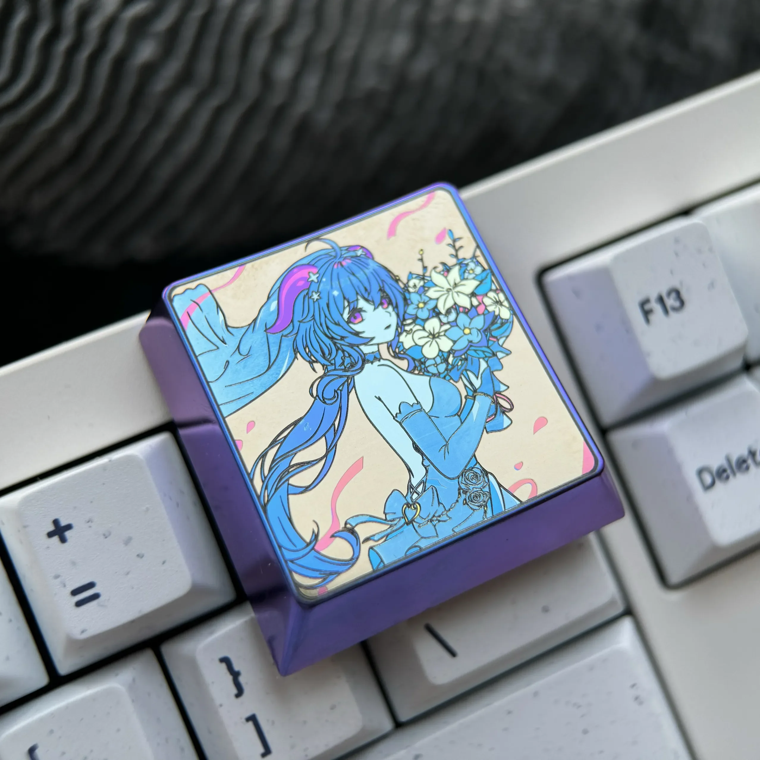 Exquisite Ganyu Titanium Keycap, highlighting its premium luminous blue titanium and detailed Ganyu-inspired character art for a luxurious keyboard.