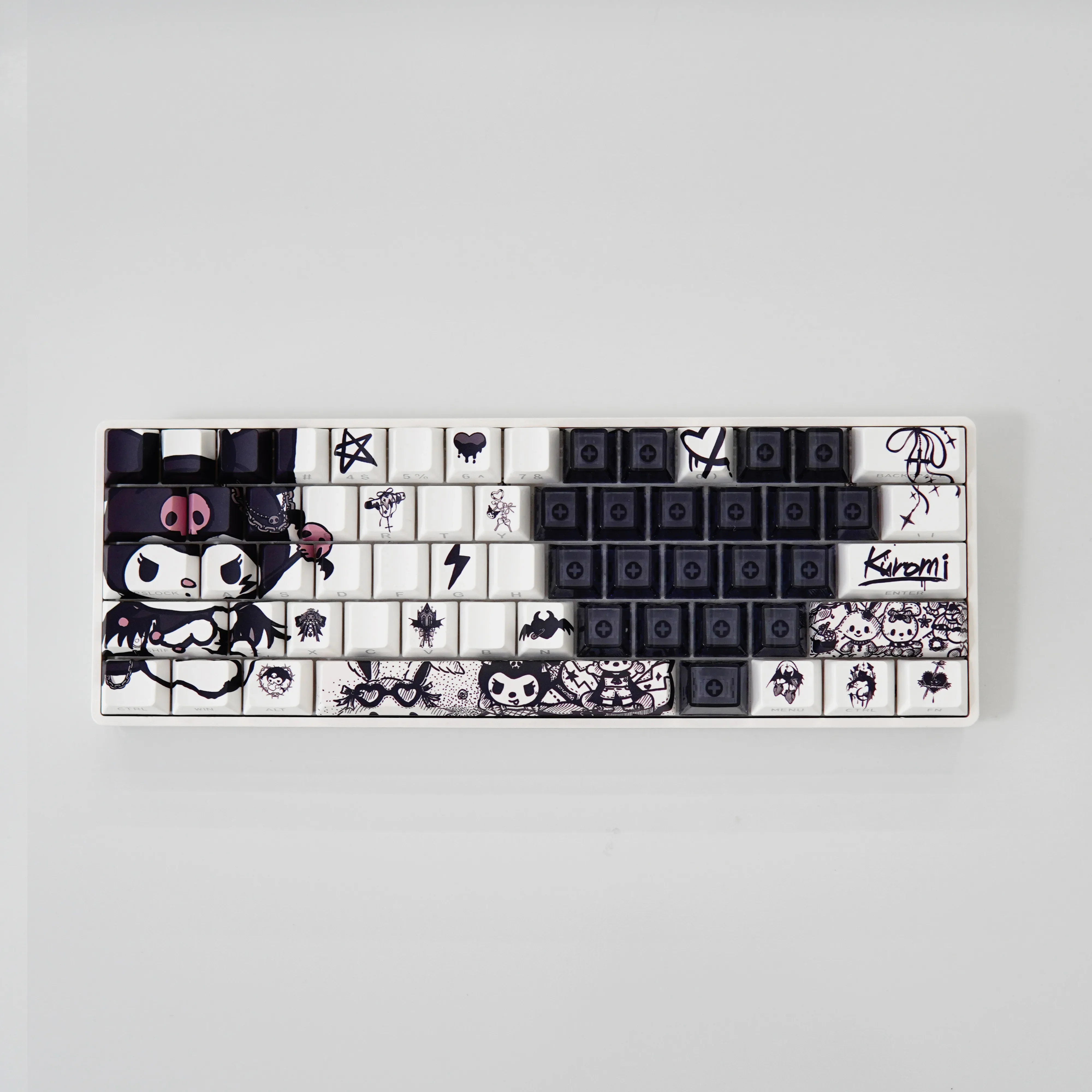 Artistic gallery showcasing Iconic Kuromi Side Engraved Keycaps. Multiple views highlight the sleek black transparent design and rebellious Kuromi design.