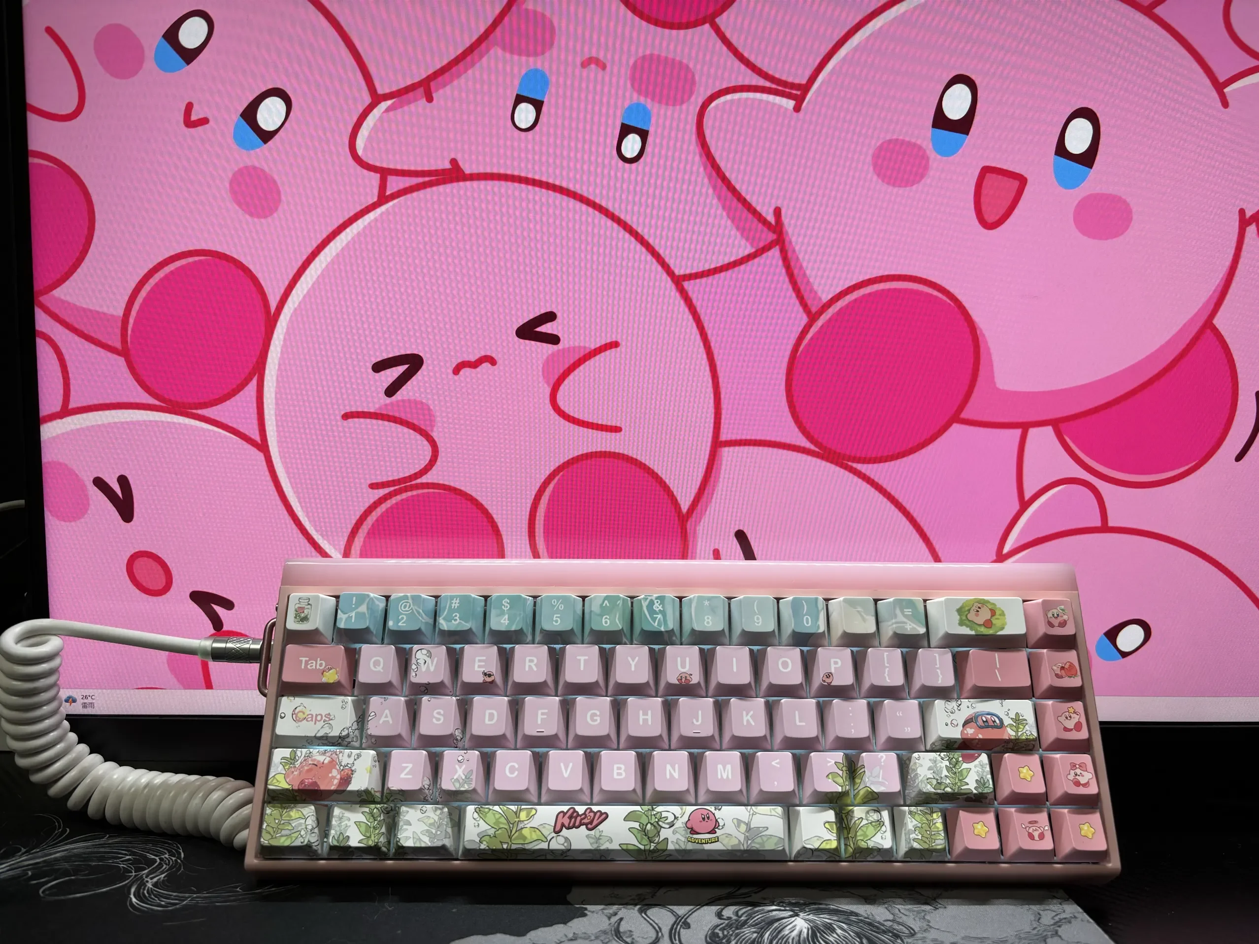 Gallery of playful Kirby pink keycaps for mechanical keyboards. Displays iconic Kirby designs and aesthetics, multi-angle, for personalization.