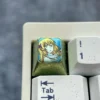 Vibrant Aiz Wallenstein Keycap, showcasing its sleek metallic form and unique industrial-artistic design.