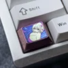 Premium titanium anime keycap featuring bold Chisato Nishikigi art with a shimmering purple finish for custom mechanical keyboards.