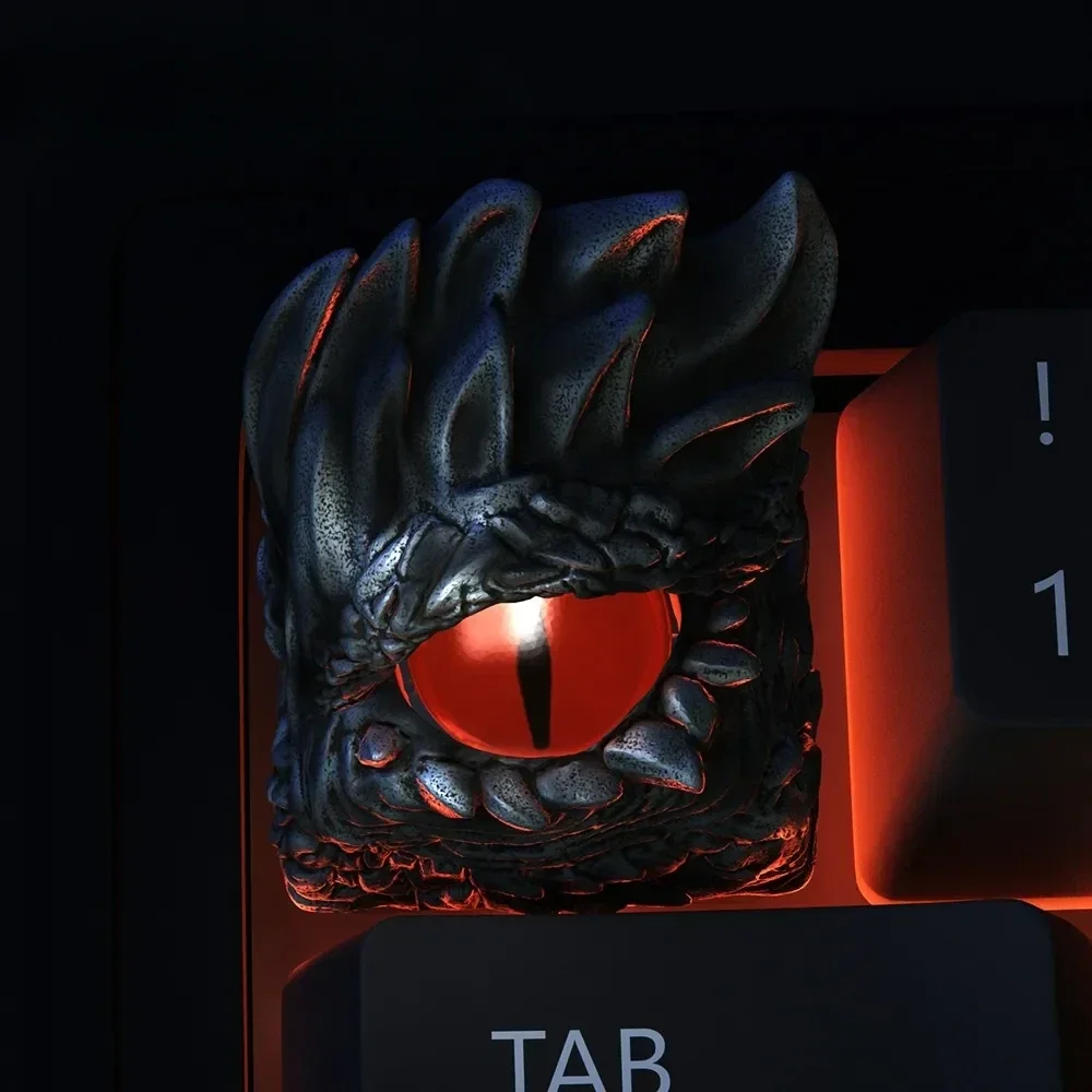 Captivating Red Eye Artisan Keycap, a handmade custom ESC masterpiece featuring a mysterious creature with glowing red eyes. Unique and artistic.
