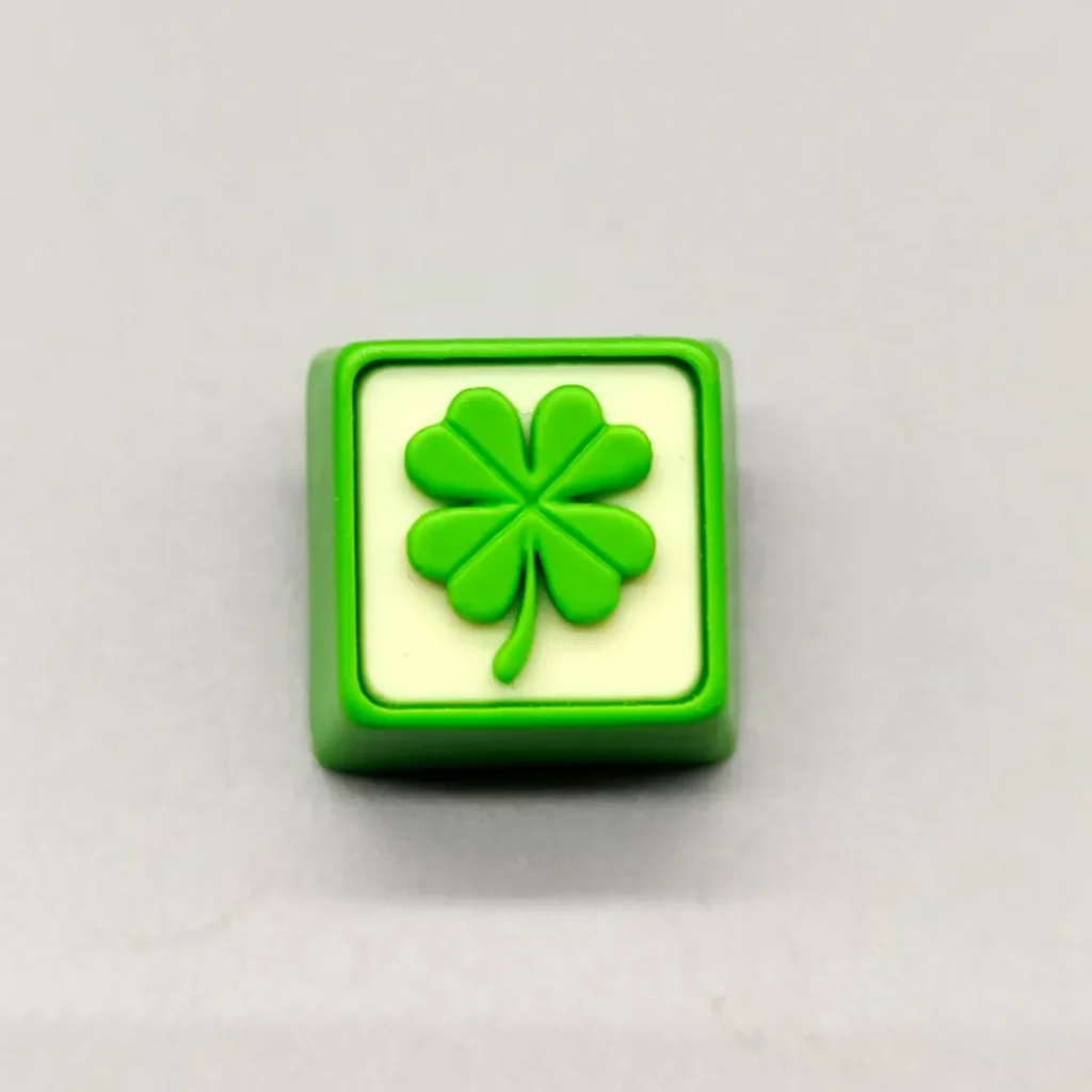 Handcrafted resin leaf artisan keycap featuring delicate green leaves for mechanical keyboards, evoking serene nature.