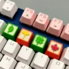 Gallery view of the handcrafted resin leaf artisan keycap, showcasing delicate green leaves embedded in clear resin from multiple serene angles.