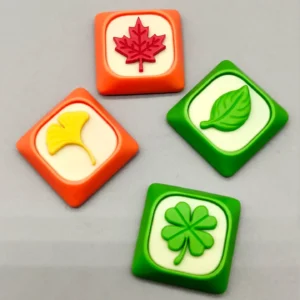 Handcrafted green leaf resin keycaps for MX switches, an artistic artisan keycap showcasing a refreshing, serene nature-inspired design.