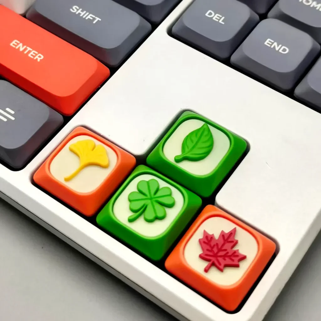 Artistic gallery views of the handcrafted green leaf resin accent keycap, showcasing its serene, whimsical nature-inspired design.