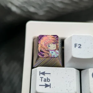 Exquisite hand-carved titanium Asuka keycap, a vibrant Evangelion artisan ESC keycap, showcasing intricate Asuka Langley Soryu details and premium design.