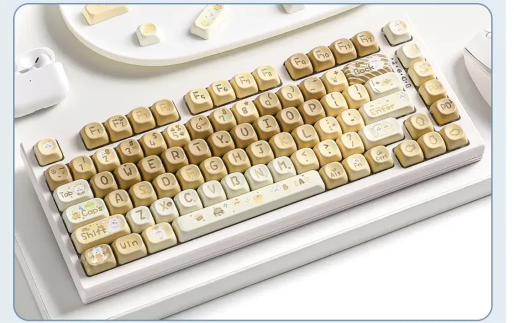 Adorable Baking Lamb Keycaps set, PBT dye-sublimated, featuring whimsical cartoon lambs baking sweet treats in a cozy pastel bakery scene.