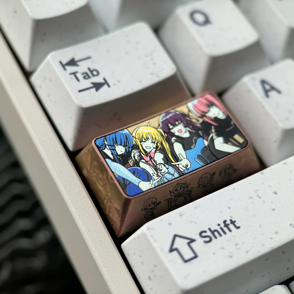 Gallery of the exclusive Bocchi the Rock! titanium keycap, highlighting vibrant anime art from various angles, a premium custom keyboard accessory.