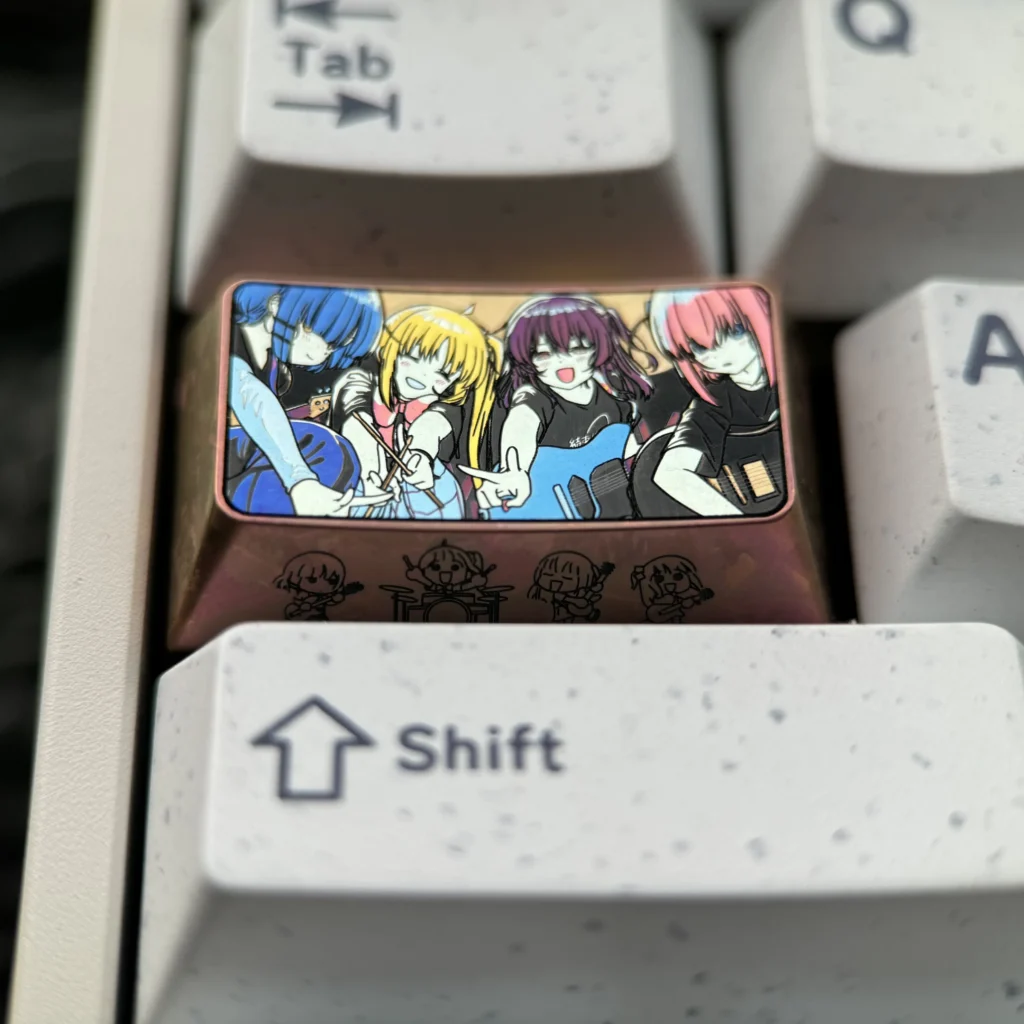 Unleash your fandom with this exclusive Bocchi Keycap. A vibrant anime art piece on polished titanium, perfect for custom keyboards.