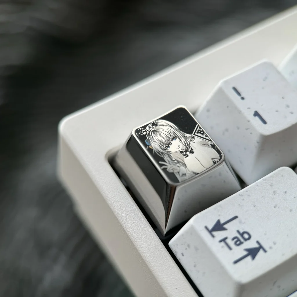 Multiple views of the Bocchi the Rock!: Hitori Gotoh Titanium Keycap, showcasing intricate pointillism art on polished silver.