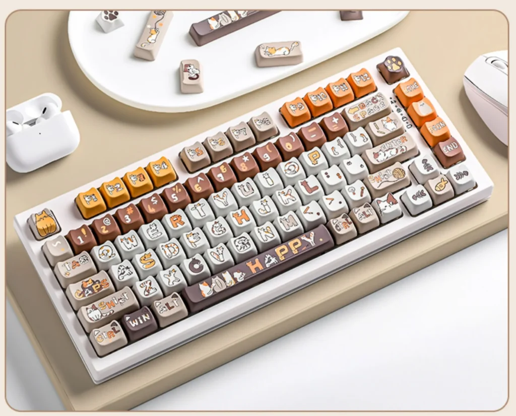 A gallery of vibrant PBT dye-sub calico cat keycaps set, highlighting adorable designs and durable quality from multiple angles for custom mechanical.