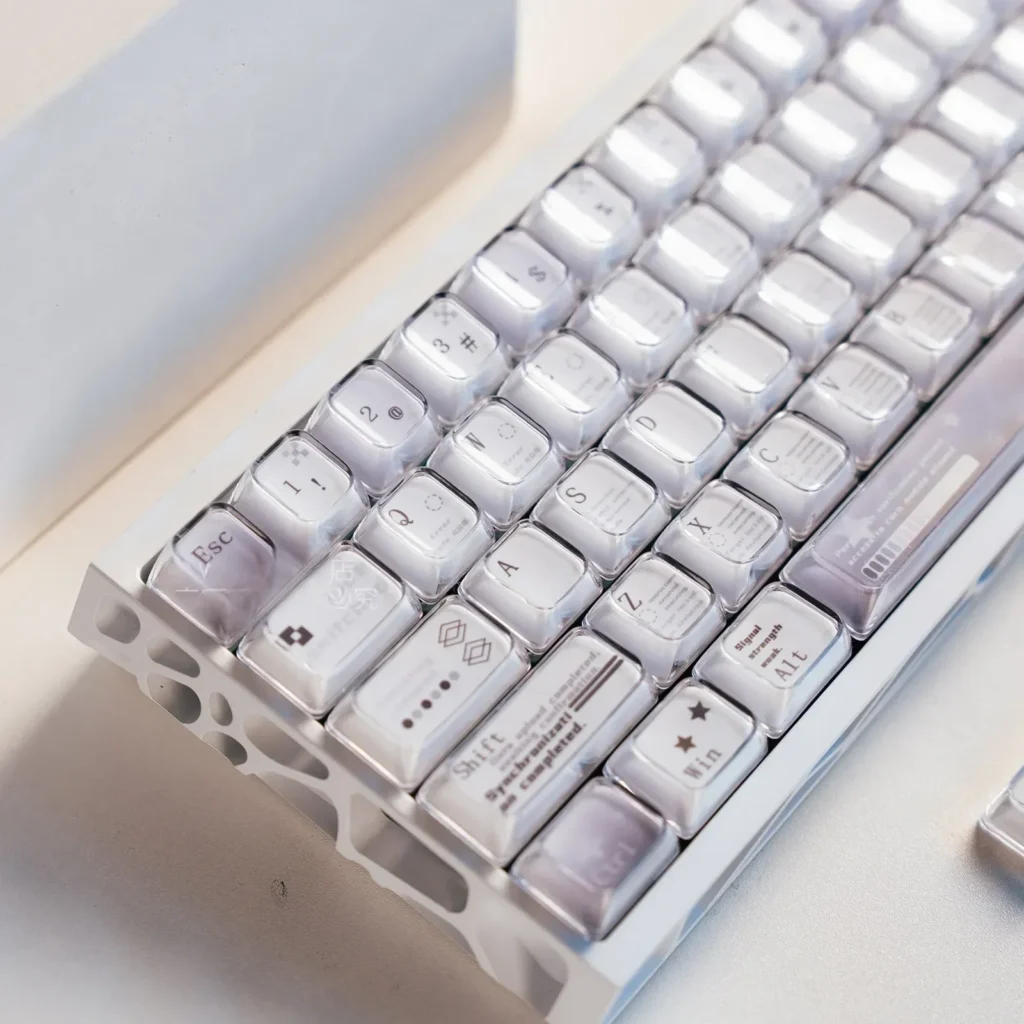 Gallery of Coconut Latte Keycaps Set. Durable dye-sub PBT mechanical keycap set in refreshing soft creams, warm browns, and subtle greens.