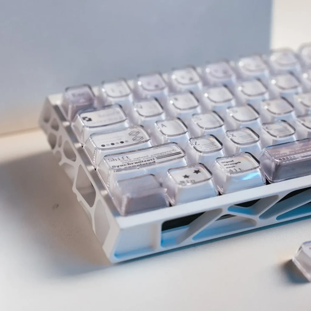 A gallery view of the Coconut Latte Keycaps set, highlighting durable dye-sub PBT. Experience soft creams, warm browns, and subtle greens.
