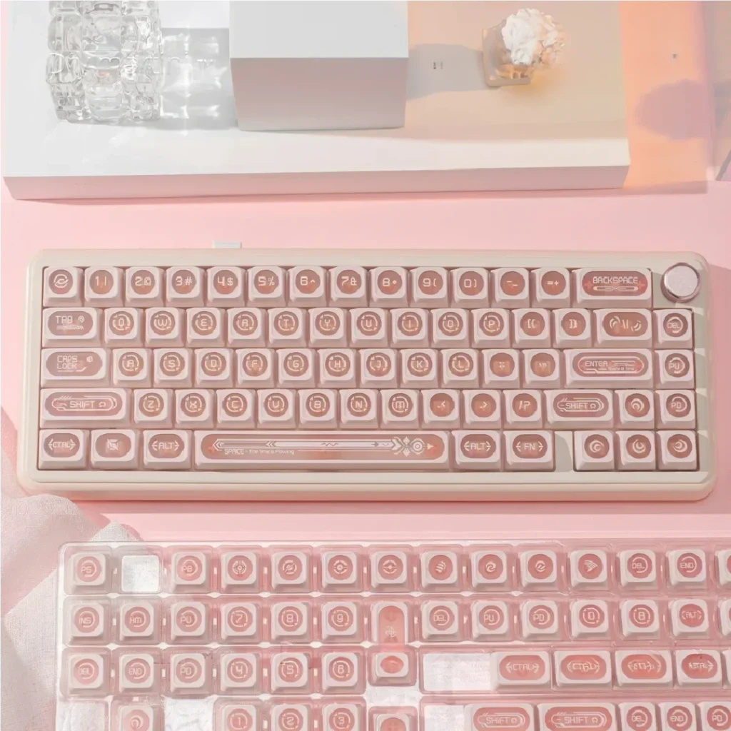Ethereal pink keycap set are meticulously displayed from multiple angles, revealing their luminous PBT cat's eye effect and mystical gemstone.