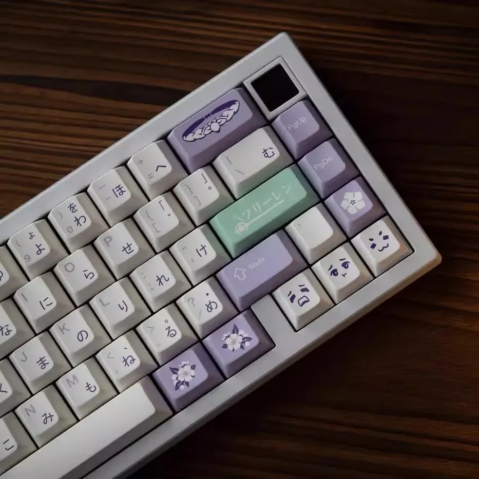 Ethereal Frieren keycap set displayed from multiple angles, showcasing intricate dye-sublimated designs and cool-toned PBT magic motifs for custom purpose.