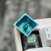 Frieren titanium keycap gallery in stunning ice crystal blue. Explore premium titanium alloy craftsmanship from multiple angles, capturing Frieren's personal.