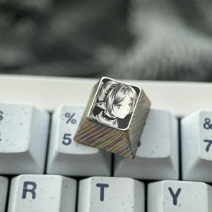 Multiple views of the hand-sculpted titanium Frieren keycap, revealing the precision-carved anime portrait and mirror-finish with intricate stippling.