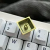 Vibrant Titanium Ishtar Artisan Keycap showcasing intricate celestial anime goddess details from multiple angles. Highlights premium finish.