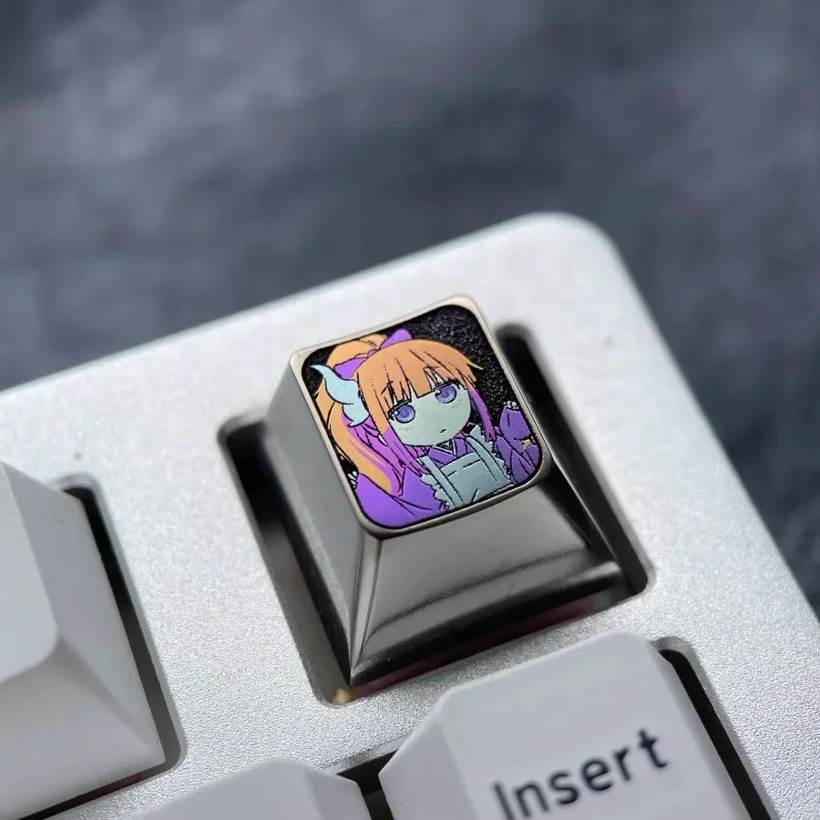 Vibrant Titanium Kanna Kamui ESC keycap from various angles, detailing its metallic purple finish and playful Dragon Maid anime design.