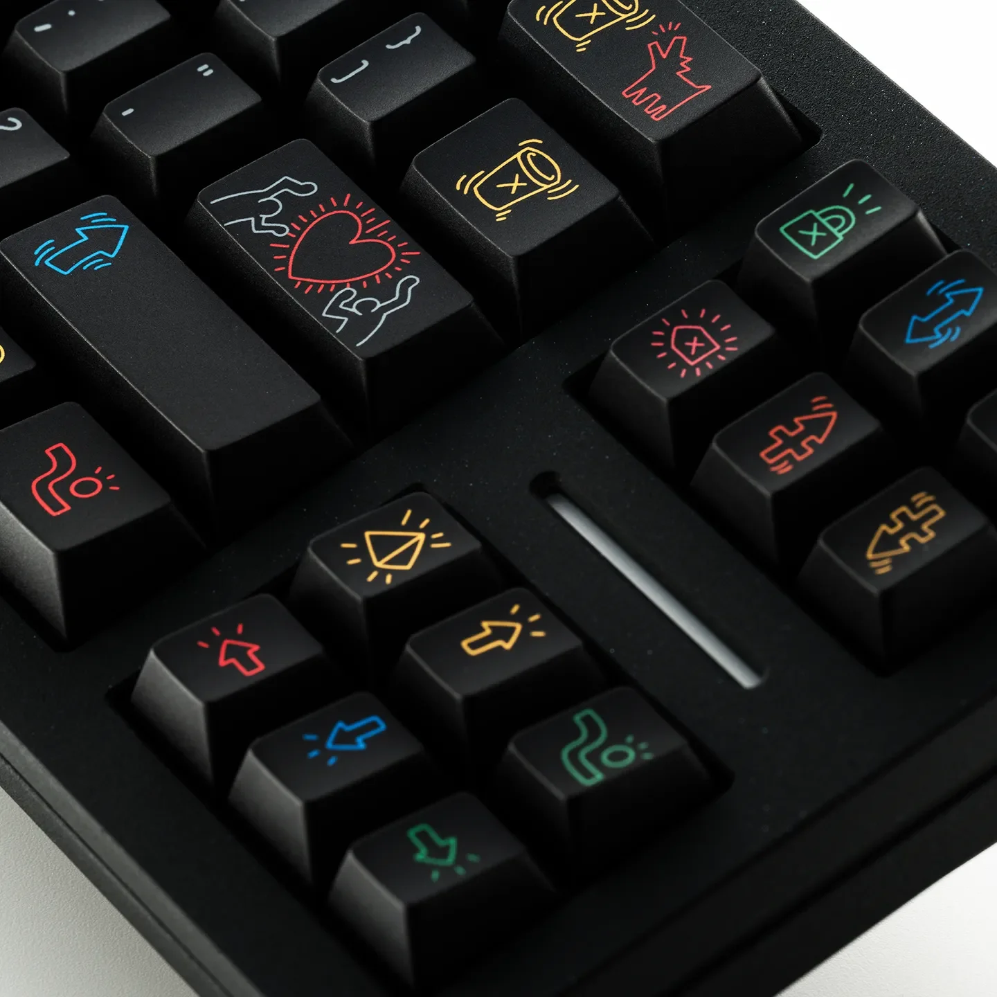 Iconic Keith Haring PBT keycap set featuring bold graffiti art, bringing urban style and premium durability to your mechanical keyboard.
