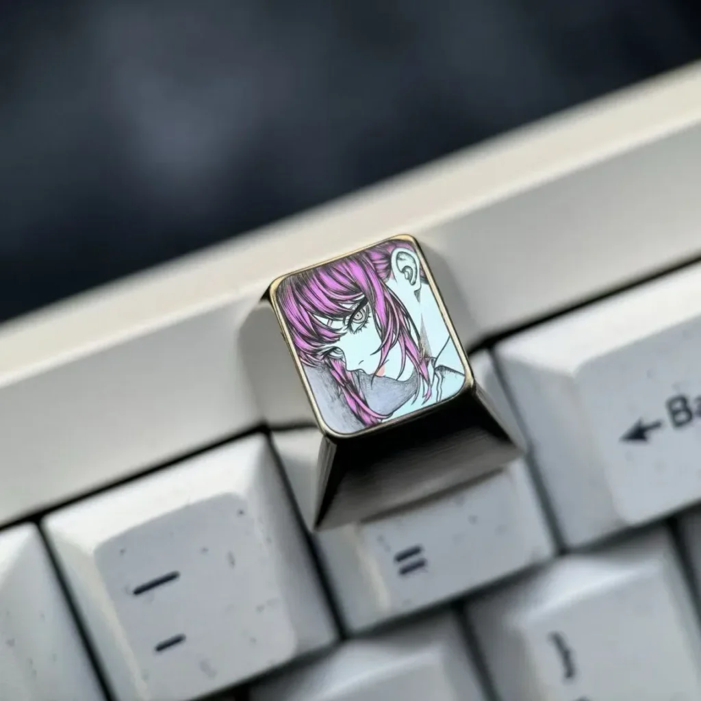 Exquisite hand-carved Makima titanium keycap for Chainsaw Man fans, showcasing elegant line art on a premium alloy surface.