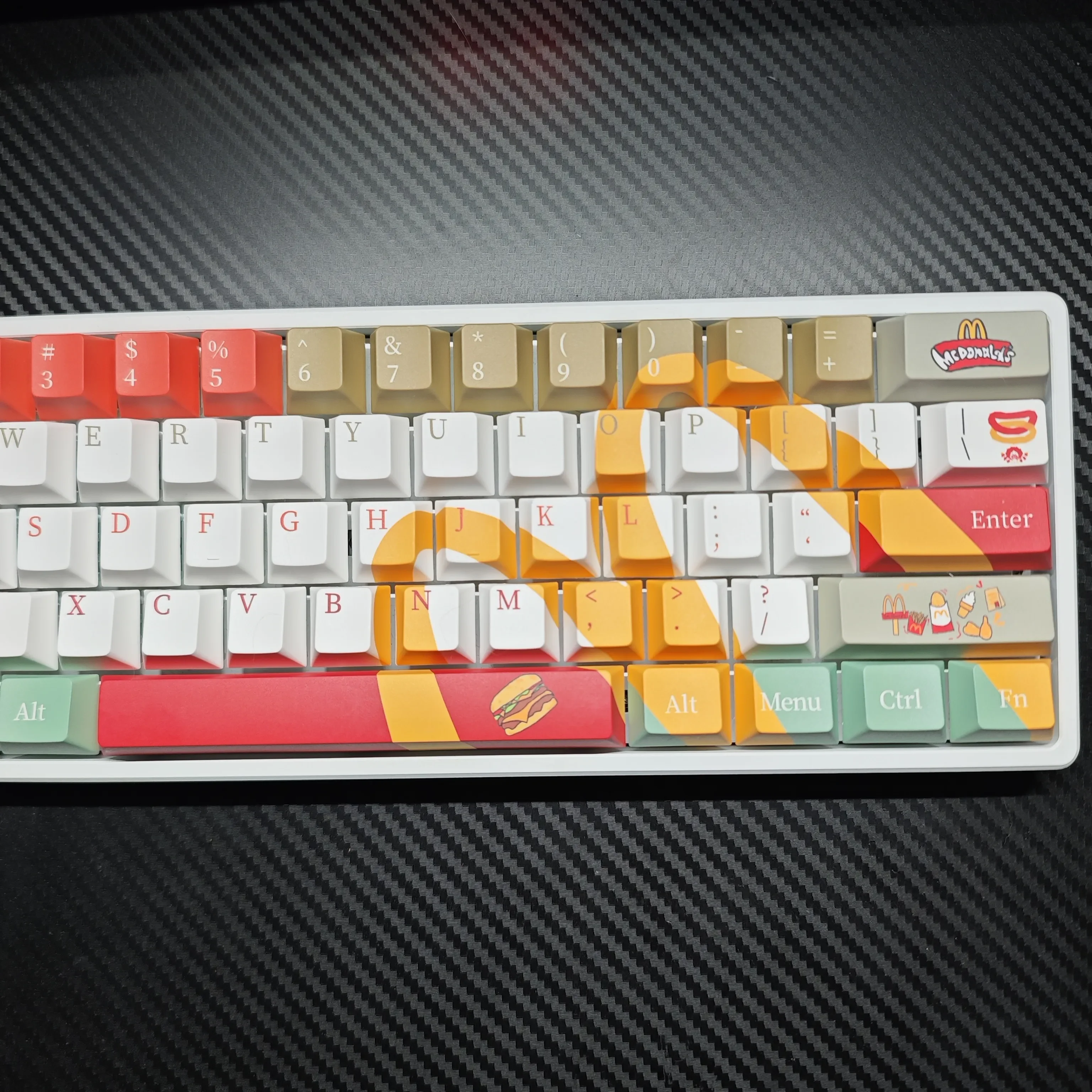 Playful McDonald's Themed Keycap Set gallery: iconic red and yellow designs from all angles. Experience pop culture fun and playful nostalgia on your keyboard.