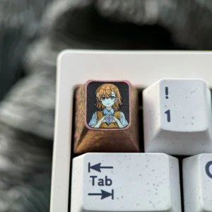Premium Titanium Misaka Mikoto keycap for mechanical keyboards, prominently displaying vibrant iconic anime character art on its gleaming metallic design.