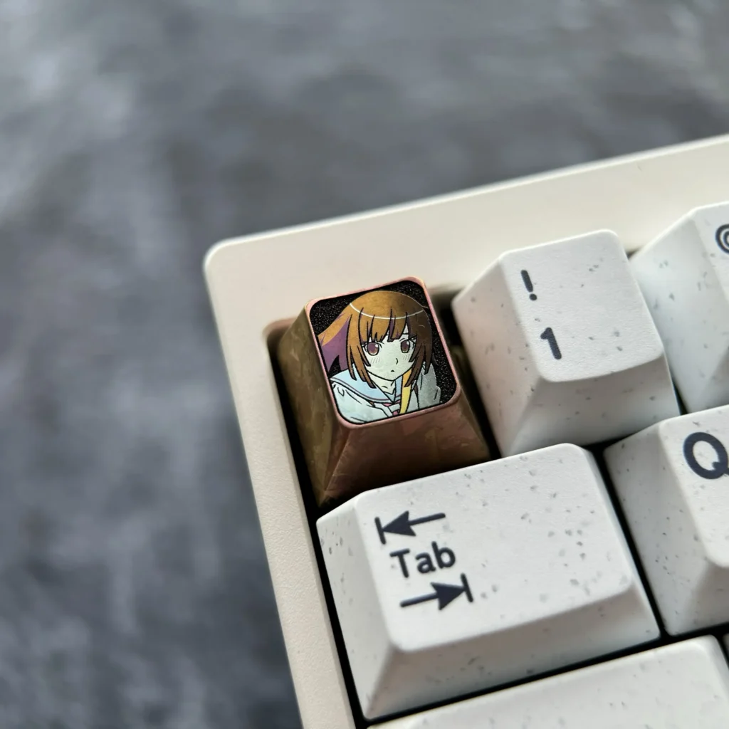 Premium chocolate-colored Nadeko art keycap. Showcasing the iconic Sengoku Nadeko design, this custom Bakemonogatari keycap offers unique design.