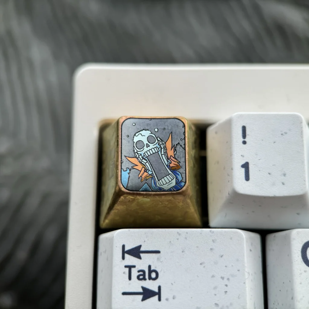 Vibrant premium titanium ONE PIECE keycap for mechanical keyboards, showcasing intricate One Piece character design and superior craftsmanship.