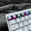 Premium Titanium ONE PIECE keycap for mechanical keyboards, showcasing intricate metal craftsmanship and vibrant One Piece character design.