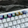 Explore the Premium Titanium ONE PIECE Artisan Keycap from various angles, highlighting its intricate design and vibrant anime details for mechanical keyboard.