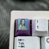 Stunning display of the premium titanium ONE PIECE artisan keycap, highlighting its intricate metal craftsmanship and vibrant, iconic One Piece character design.