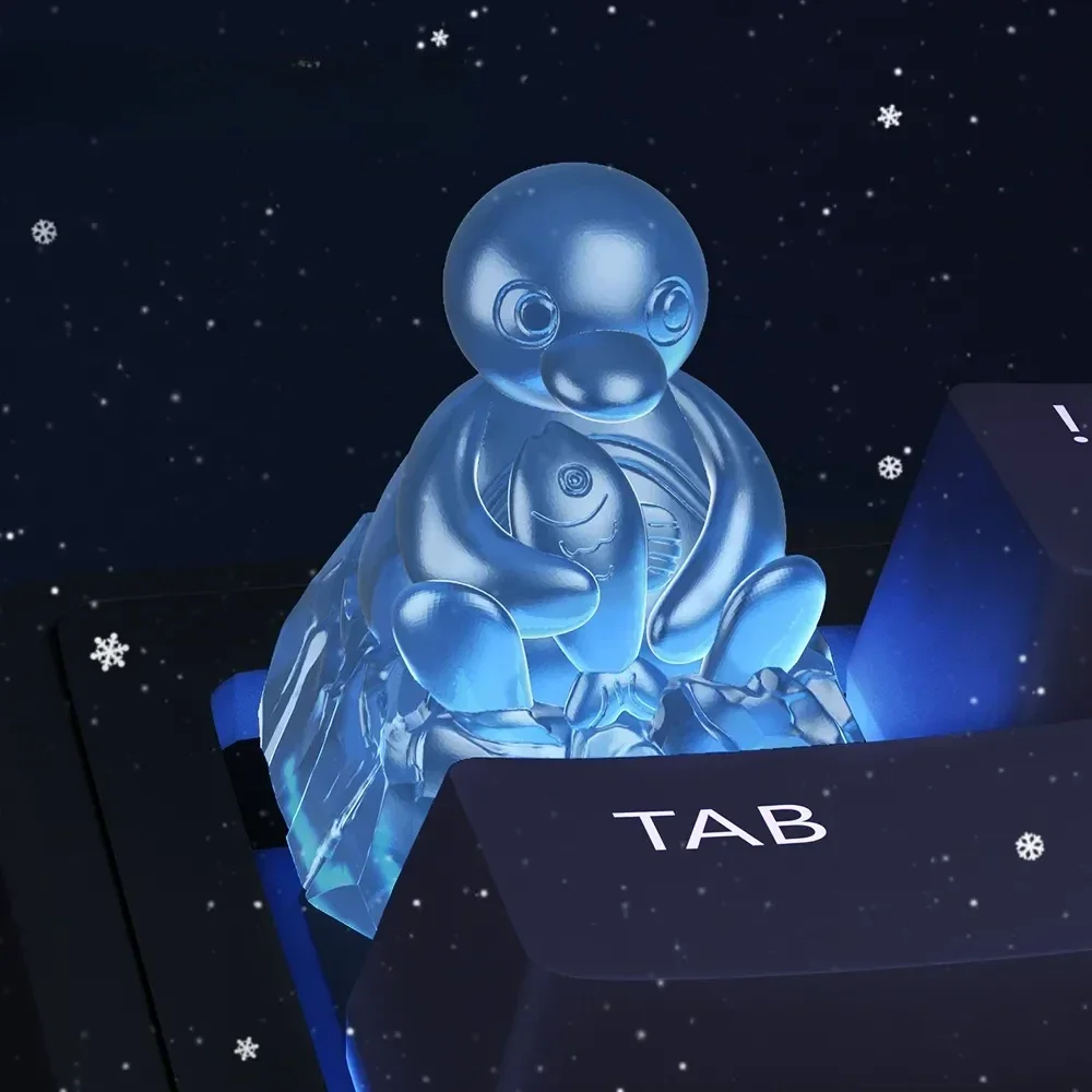 Whimsical handcrafted Pingu Ice Sculpture ESC Keycap. Sculpted from translucent resin, this delightful Pingu keycap charmingly mimics an ice figurine.