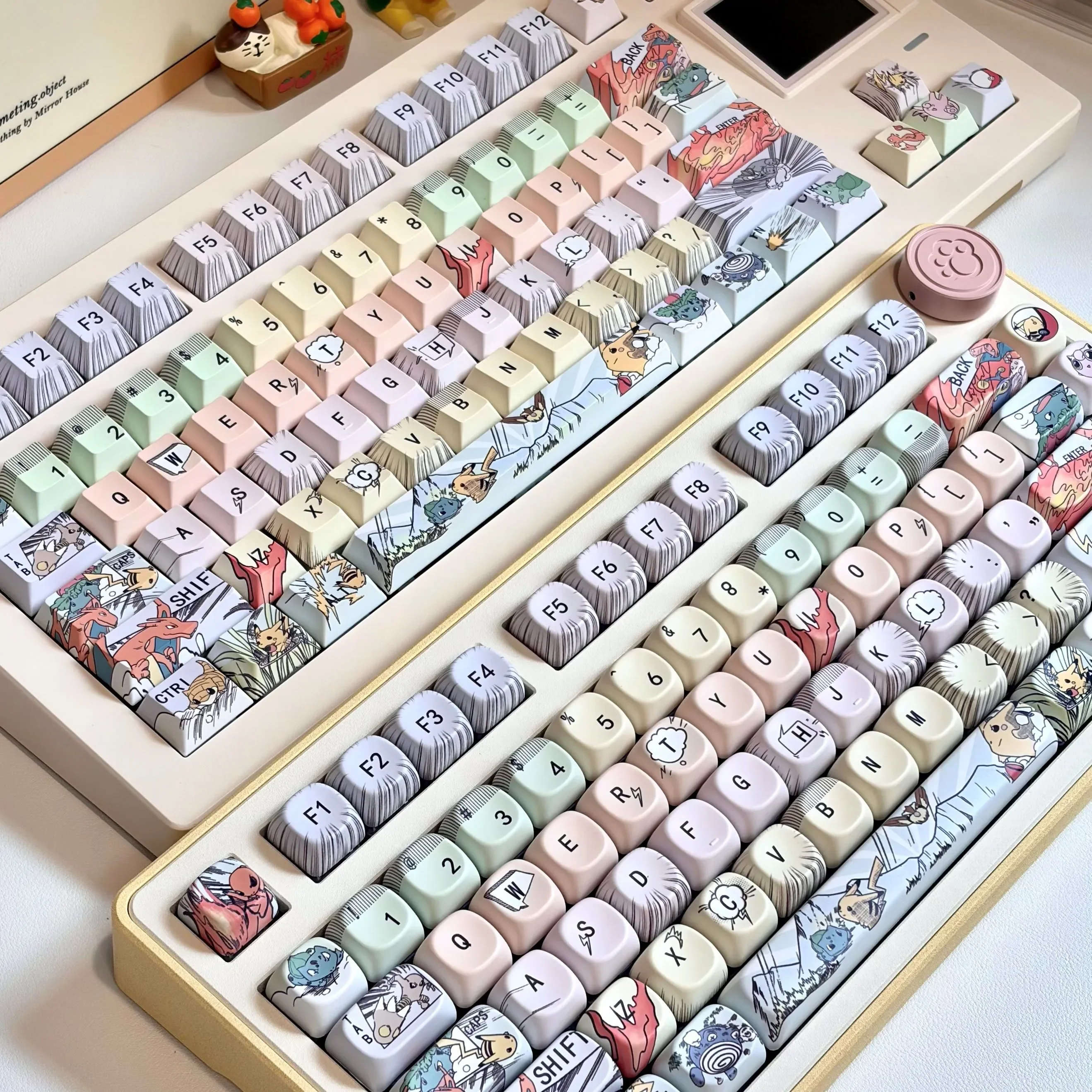 A playful gallery image of the 149-key Pokemon Keycaps Set, showcasing the full OEM profile keycaps with vibrant, animated Pokemon characters.