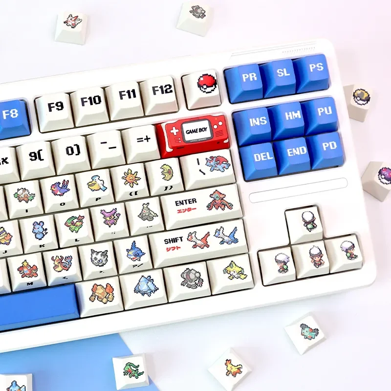 Vibrant Pokemon Pixel Keycap set, PBT dye-sublimated, showing nostalgic 3rd Gen pixel art from various angles for gaming mechanical keyboards.