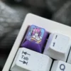 Exclusive Rias Gremory Titanium artisan keycap, showcasing its vibrant anime sculpture and captivating purple ice crystal finish, a true collectors.